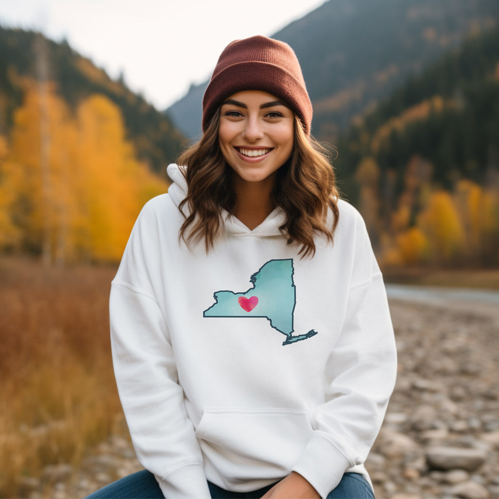 woman wearing a NY state hoodie with a heart on it